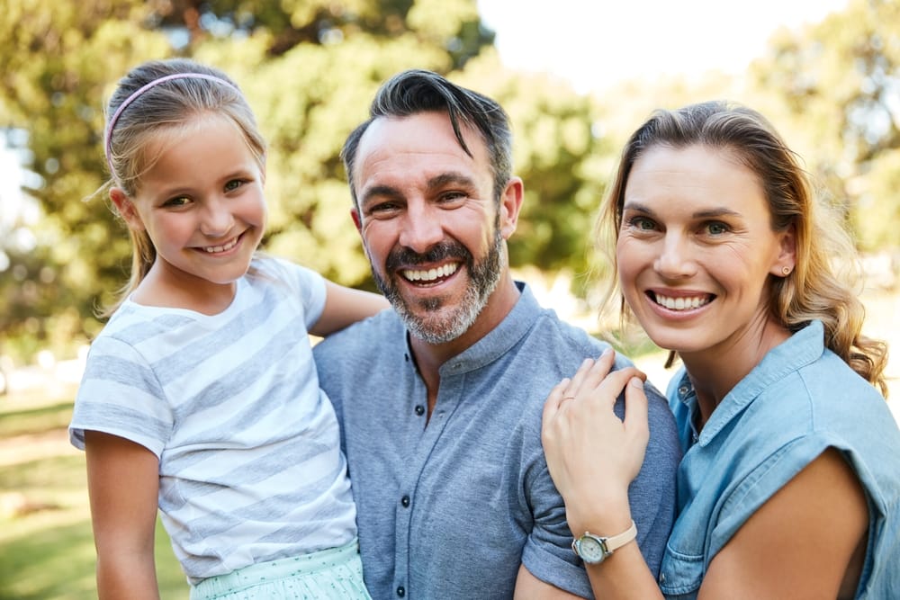 Family of 3 outdoors - Root Canal Winter Park