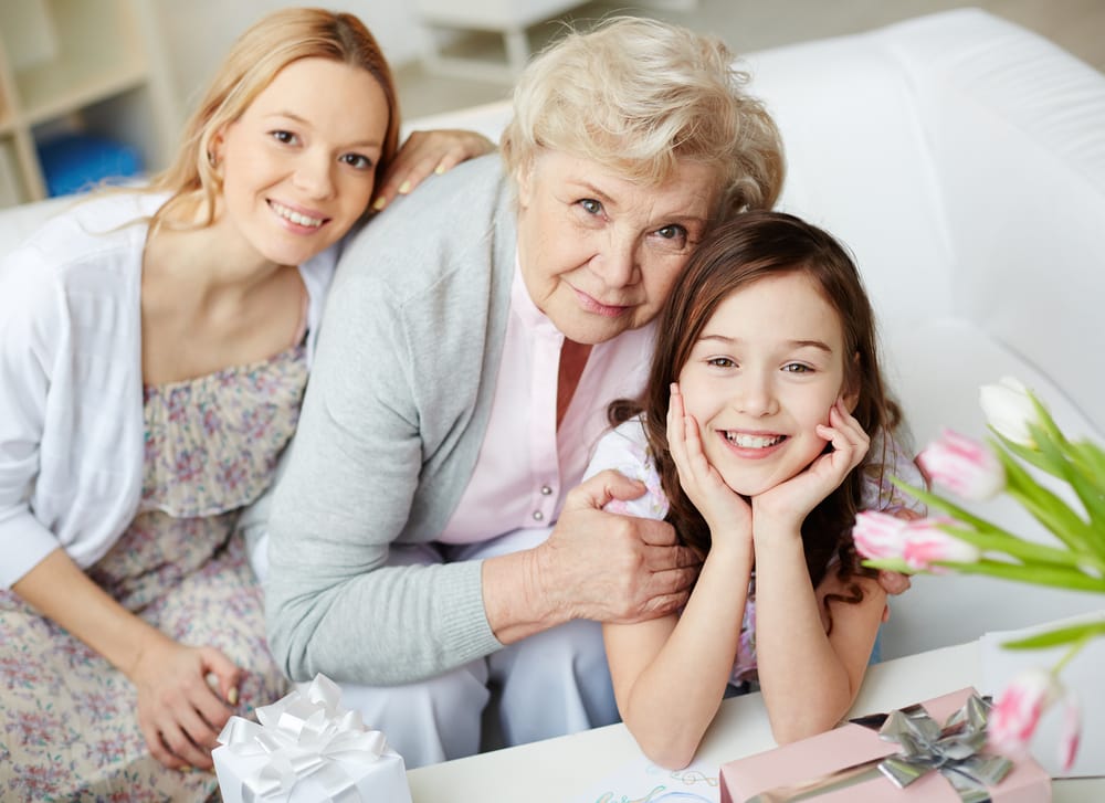 Grandmother and granddaughters posing for a photo - Root Canal Winter Park