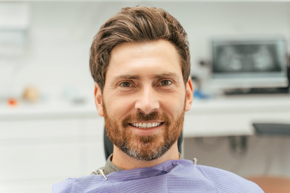bearded man at the dentist