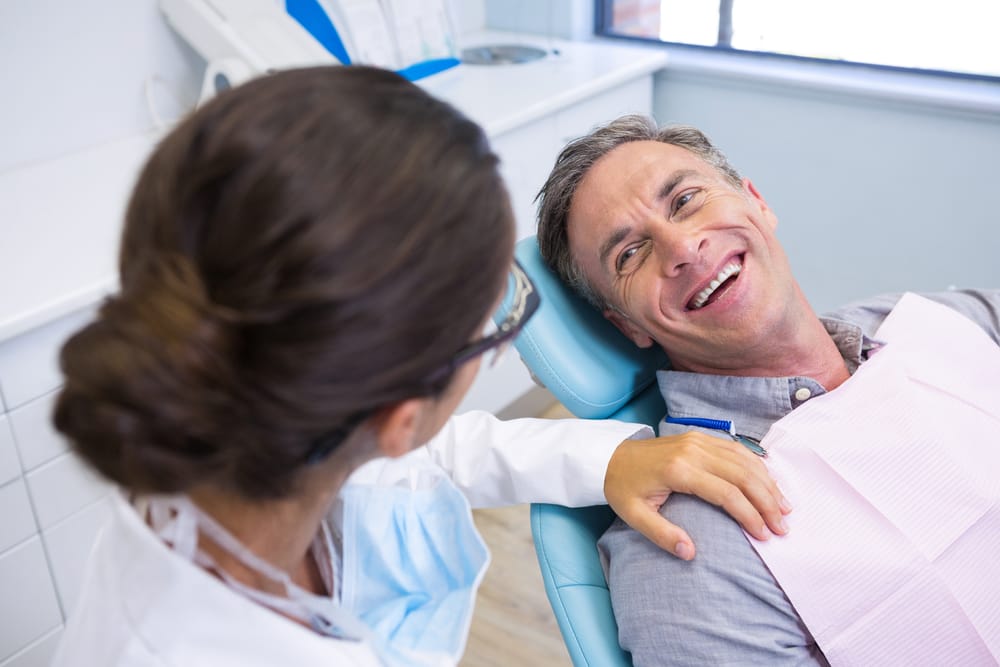 middle-aged man at the dentist - Dentist in Winter Park