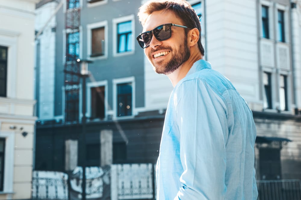 man wearing sun glasses outdoors - Orlando Root Canals